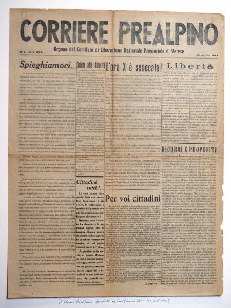 Testo tipografico. Prima pagina del giornale "Corriere Prealpino" del 26 aprile 1945