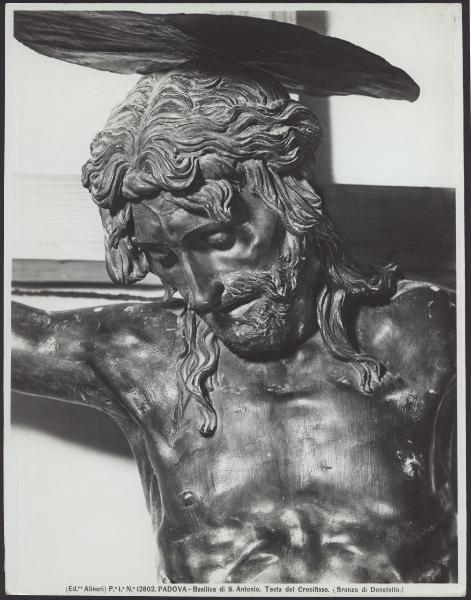Padova - Basilica di S. Antonio. Altare maggiore, Donatello e aiuti, Crocefisso, particolare della testa, scultura in bronzo (1443-1450).