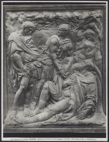 Bologna - Basilica di S. Petronio. Portale centrale, Jacopo della Quercia, Ubriachezza di Noè, formella, bassorilievo in bronzo.