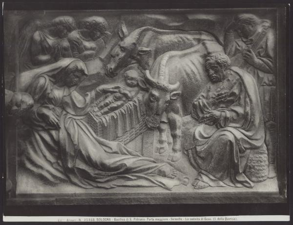 Bologna - Basilica di S. Petronio. Portale centrale, Jacopo della Quercia, Natività, formella, bassorilievo in bronzo.