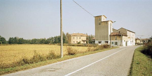 San Biagio - Strada - Campo di grano - Edifici con insegna commerciale