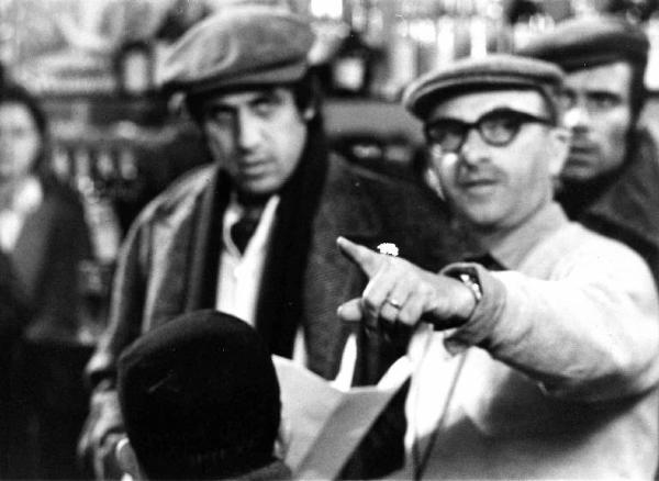 Set del film "Bianco, rosso e..." - Regia Alberto Lattuada - 1972 - Il regista Alberto Lattuada con l'attore Adriano Celentano sul set
