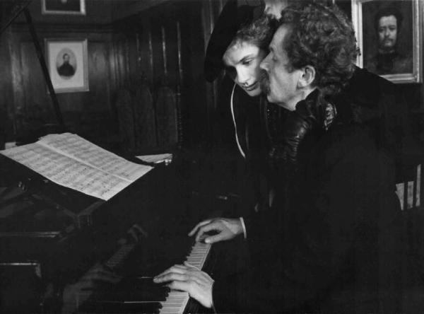 Scena del film "Al di lÃ  del bene e del male" - Regia Liliana Cavani - 1977 - Gli attori Dominique Sanda e Erland Josephson al pianoforte