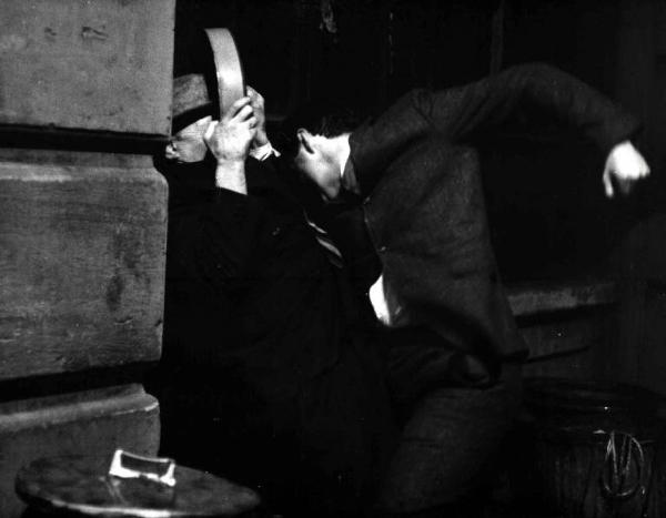 Scena del film "Assassination" - Regia Emilio Miraglia - 1967 - L'attore Henry Silva tira pugni a un attore non identificato