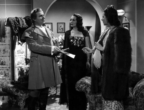 Scena del film "Cantate con me" - Guido Brignone - 1940 - Gli attori Giuseppe Lugo, Laura Nucci e Rubi Dalma
