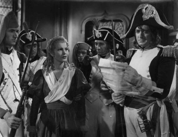 Scena del film "Il Conte di Brechard" - Regia Mario Bonnard - 1938 - L'attrice Luisa Ferida trattenuta dalle guardie