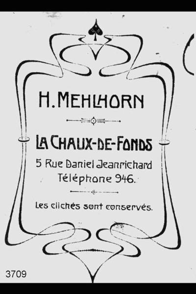 Riproduzione del marchio commerciale dello studio fotografico "H.Mehlhorn" a La Chaux de Fonds.