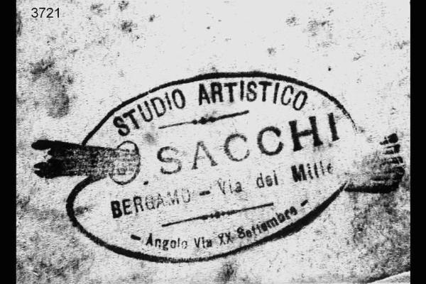 Riproduzione del timbro commerciale dello "Studio artistico Sacchi".