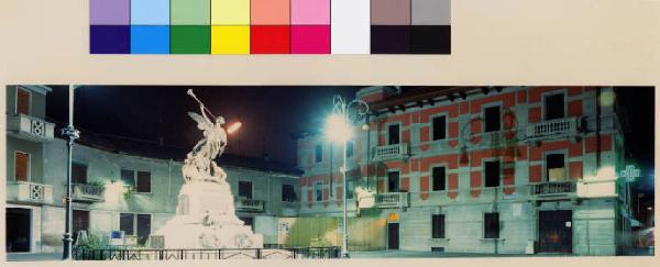 Melzo - piazza Vittoria dirzione via Candiani - monumento alla Vittoria - edifici residenziali - palazzina