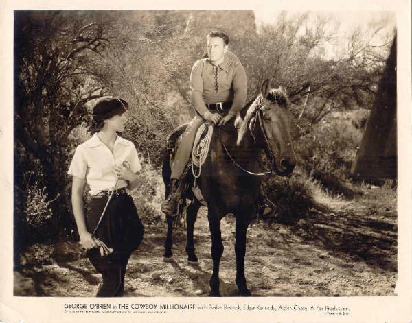 Scena del film "La corriera del West " - regia Edward F. Cline - 1935 - attori George O'Brien e Evalyn Bostock