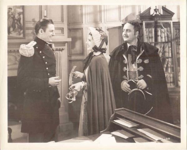 Scena del film "Carmencita" - regia Lynn Shores - 1936 - attori Tom Keene, Rita Hayworth e Gino Corrado