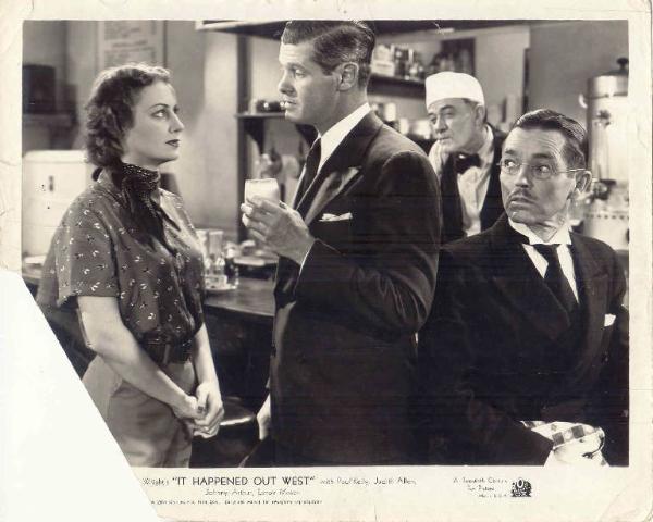 Scena del film "It Happened Out West" - regia Howard Bretherton - 1937 - attori Judith Allen e Paul Kelly