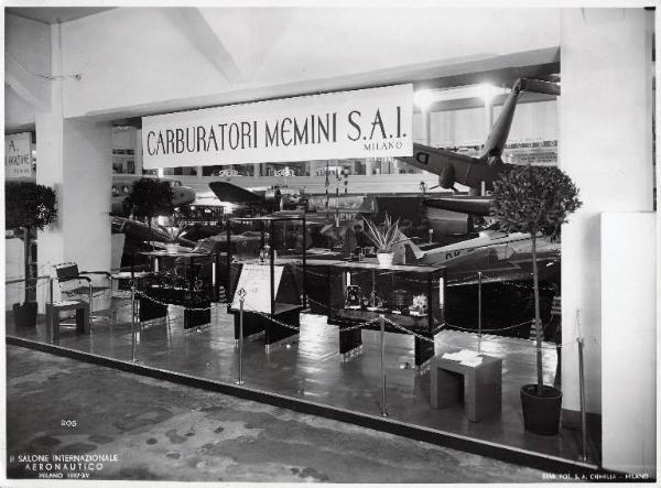 Fiera di Milano - Salone internazionale aeronautico 1937 - Settore accessori, strumenti e materie prime lavorate e semilavorate - Stand di carburatori Memini SAI