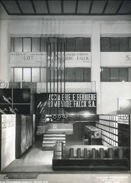 Fiera di Milano - Salone internazionale aeronautico 1937 - Settore accessori, strumenti e materie prime lavorate e semilavorate - Stand delle Acciaierie e ferriere lombarde Falck