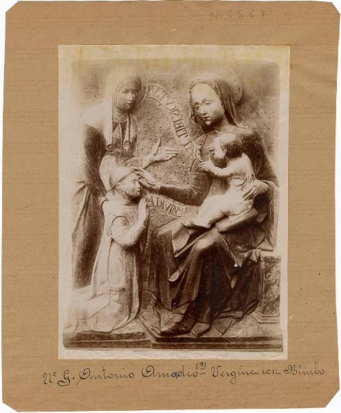 Amadeo, Giovanni Antonio? - Madonna con Bambino, santa e donatore - Scultura - Bassorilievo