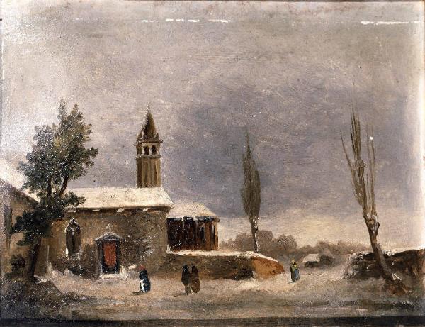 Veduta di un borgo con chiesa sotto la neve
