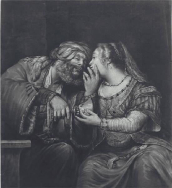 Un uomo e una donna vestiti all'orientale che si baciano