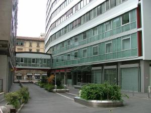 Casa per abitazioni, uffici, negozi e autorimessa Corso Italia 13-17