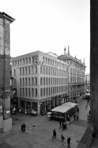 Veduta generale dell'edificio su piazza dei Mercanti e via dei Mercanti - fotografia di Suriano, Stefano (2016)