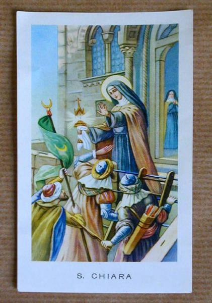 S. Chiara d'Assisi mentre ferma dei Saraceni di fronte alla porta d'una chiesa