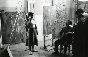 Anticoli Corrado - studio di un pittore - ragazza in mostra - tre uomini la osservano