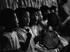 Cina - bambini a scuola - lezione di musica