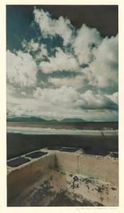 Muro - spiaggia - mare e nuvole
