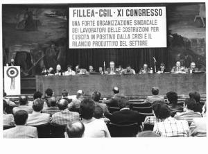 XI congresso Fillea Cgil (edili) - Interno - Tavolo della presidenza con oratori - Parola d'ordine