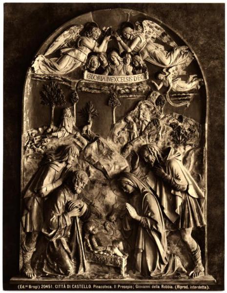 Città di Castello - Pinacoteca. Giovanni della Robbia, Natività, bassorilievo in ceramica parzialmente invetriata.