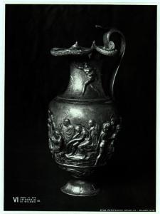 Milano - VI Triennale d'Arte - Sala dell'Oreficeria Antica, oinochoè (brocca) in argento decorata a sbalzo (inizi II sec -)