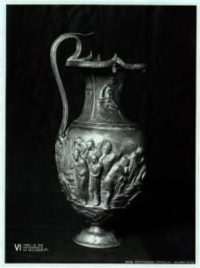 Milano - VI Triennale d'Arte - Sala dell'Oreficeria Antica, oinochoè (brocca) in argento decorata a sbalzo (inizi II sec -)