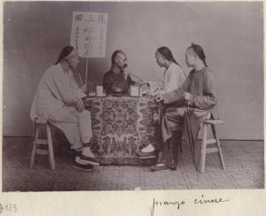 Scena di genere - Quattro uomini seduti a tavola per pranzo