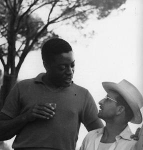 Set del film "Senza pietà" - Regia Alberto Lattuada - 1948 - Il regista Alberto Lattuada e l'attore John Kitzmiller
