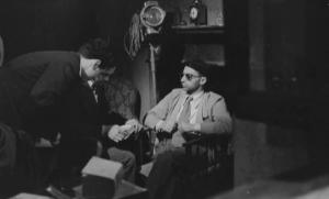 Set del film "Giacomo l'idealista" - Regia Alberto Lattuada - 1943 - Il regista Alberto Lattuada con due operatori