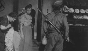 Scena del film "Giacomo l'idealista" - Regia Alberto Lattuada - 1943 - L'attrice Marina Berti con attori non identificati