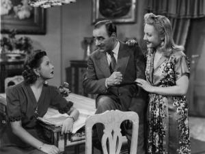 Scena del film "Abbasso la miseria" - Regia Gennaro Righelli - 1944 - Gli attori Dina Romano, Virgilio Riento e Marisa Vernati
