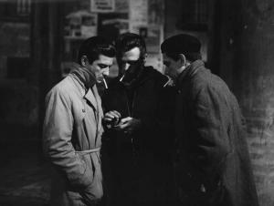 Scena del film "La banda Casaroli" - Regia Florestano Vancini - 1962 - Gli attori Jean-Claude Brialy, Renato Salvatori e Tomas Milian