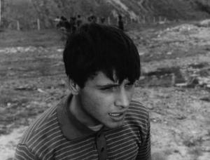 Scena del film "La commare secca" - Regia Bernardo Bertolucci - 1962 - L'attore Alvaro D'Ercole in primo piano.