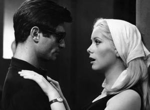 Set del film "La costanza della ragione" - Regia Pasquale Festa Campanile - 1964- L'attore Sami Frey e l'attrice Catherine Deneuve in primo piano di profilo.
