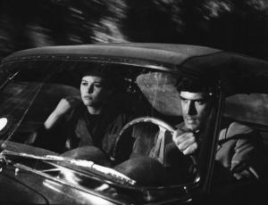 Fotografia del film "I delfini" - Regia Francesco Maselli 1960 - L'attrice Claudia Cardinale e l'attore Tomas Milian in macchina.