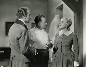 Sul set del film "Il dottor Antonio" - Regia Enrico Guazzoni, 1937 - Enrico Guazzoni dà istruzioni a Margherita Bagni e a Ennio Cerlesi prima di girare una scena.