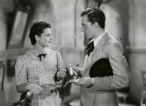 Scena del film "Le due madri" - Regia Amleto Palermi, 1938 - Maria Denis, sulla sinistra, e Vittorio De Sica, sulla destra, si guardano intensamente.
