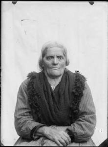Val Brembana. Ritratto di donna anziana con scialle incrociato al petto