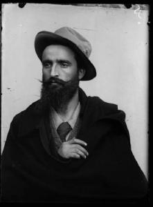 Val Brembana. Ritratto di uomo con mantello e cappello