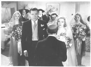 Scena del film "Pronto per due" - regia Alfred Santell - 1937 - attori Herbert Marshall, Glenda Farrell e Donald Meek