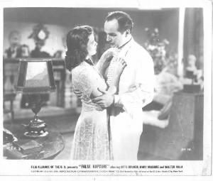 Scena del film "Black Eyes" (Gran Bretagna)/ "False Rapture" (USA) - regia Herbert Brenonr - 1939 - attori Mary Maguire e Walter Rilla