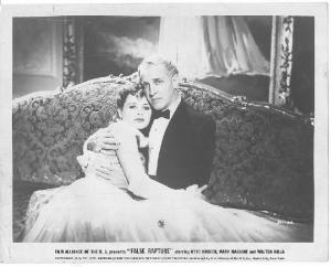 Scena del film "Black Eyes" (Gran Bretagna)/ "False Rapture" (USA) - regia Herbert Brenonr - 1939 - attori Mary Maguire e Otto Kruger