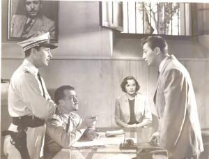 Scena del film "Il tesoro di Vera Cruz" - regia Don Siegel - 1949 - attori Robert Mitchum, Jane Greer, Ramon Novarro e Don Alvarado