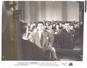 Scena del film "Nata ieri" - regia George Cukor - 1950 - attori Judy Holliday e William Holden