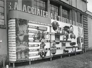 Fiera di Milano - Campionaria 1936 - Padiglione della meccanica - Stand esterno della S. A. Acciaieria e tubificio di Brescia (Tubi Togni)
